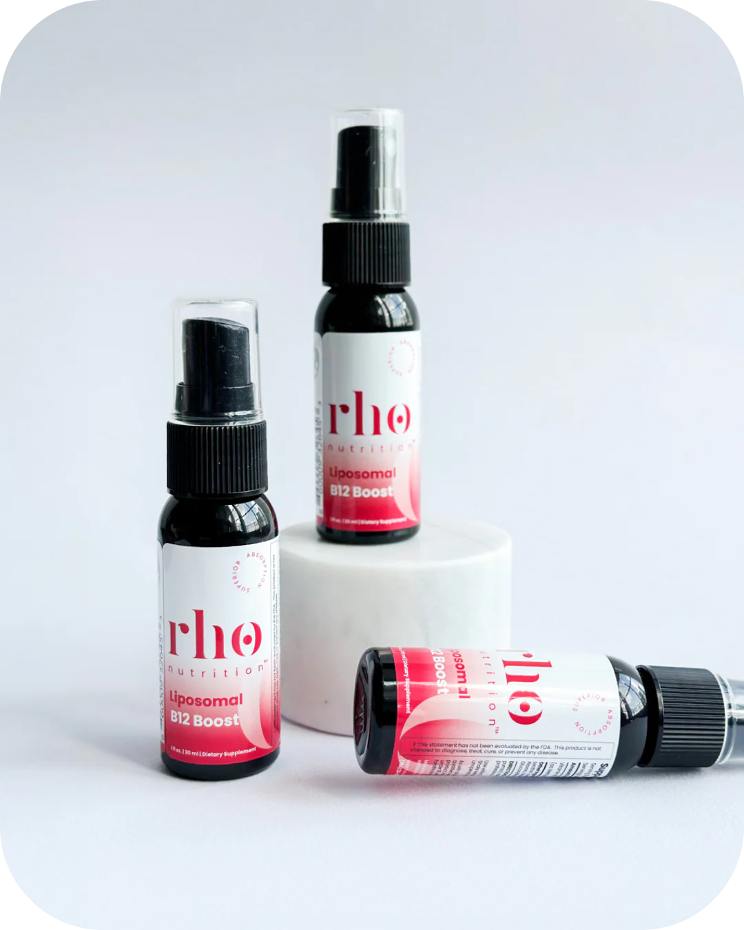 Rho Nutrition Liposomal Methyl B12 spray bottles on white display