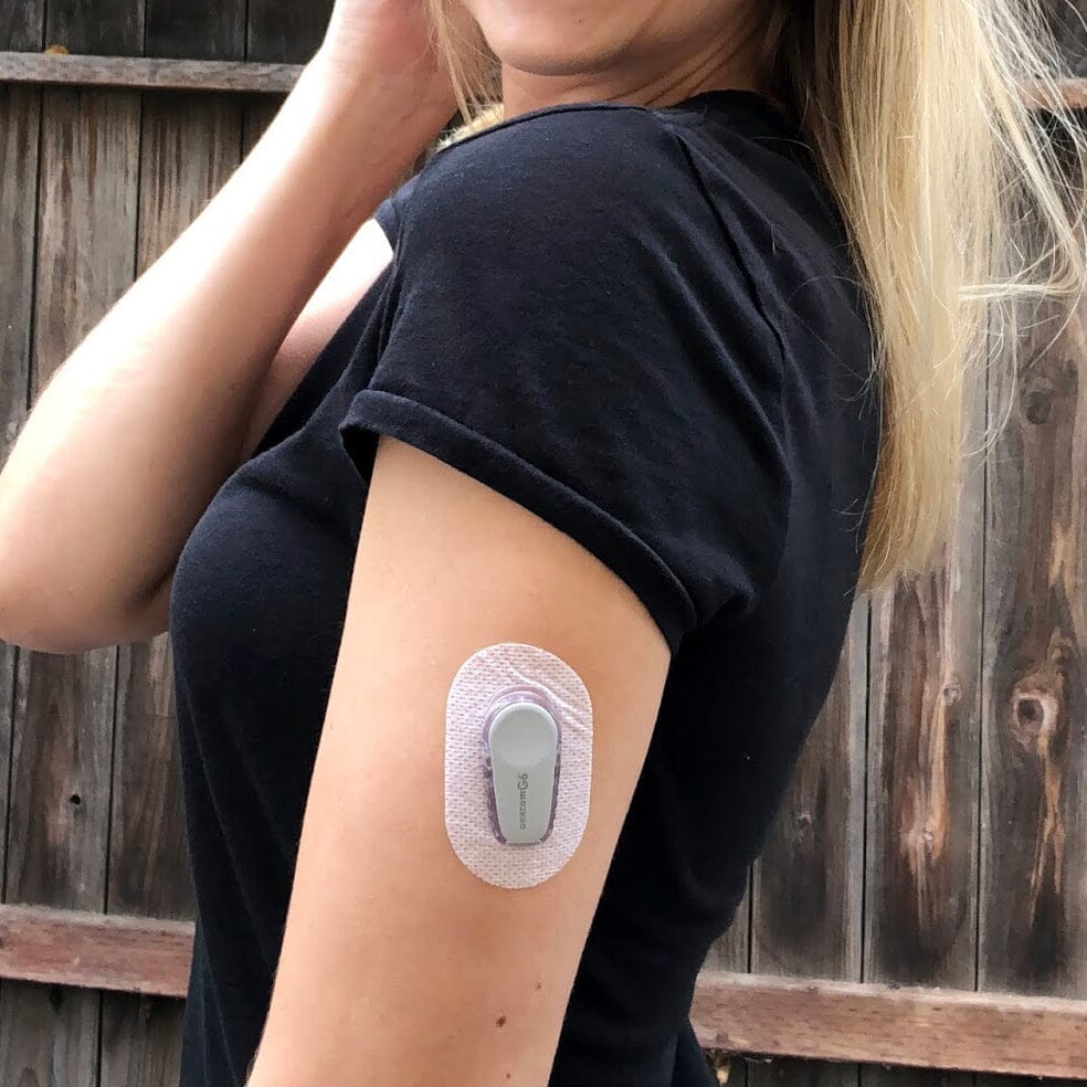 Dexcom G6 sensor worn on upper arm glucose monitoring