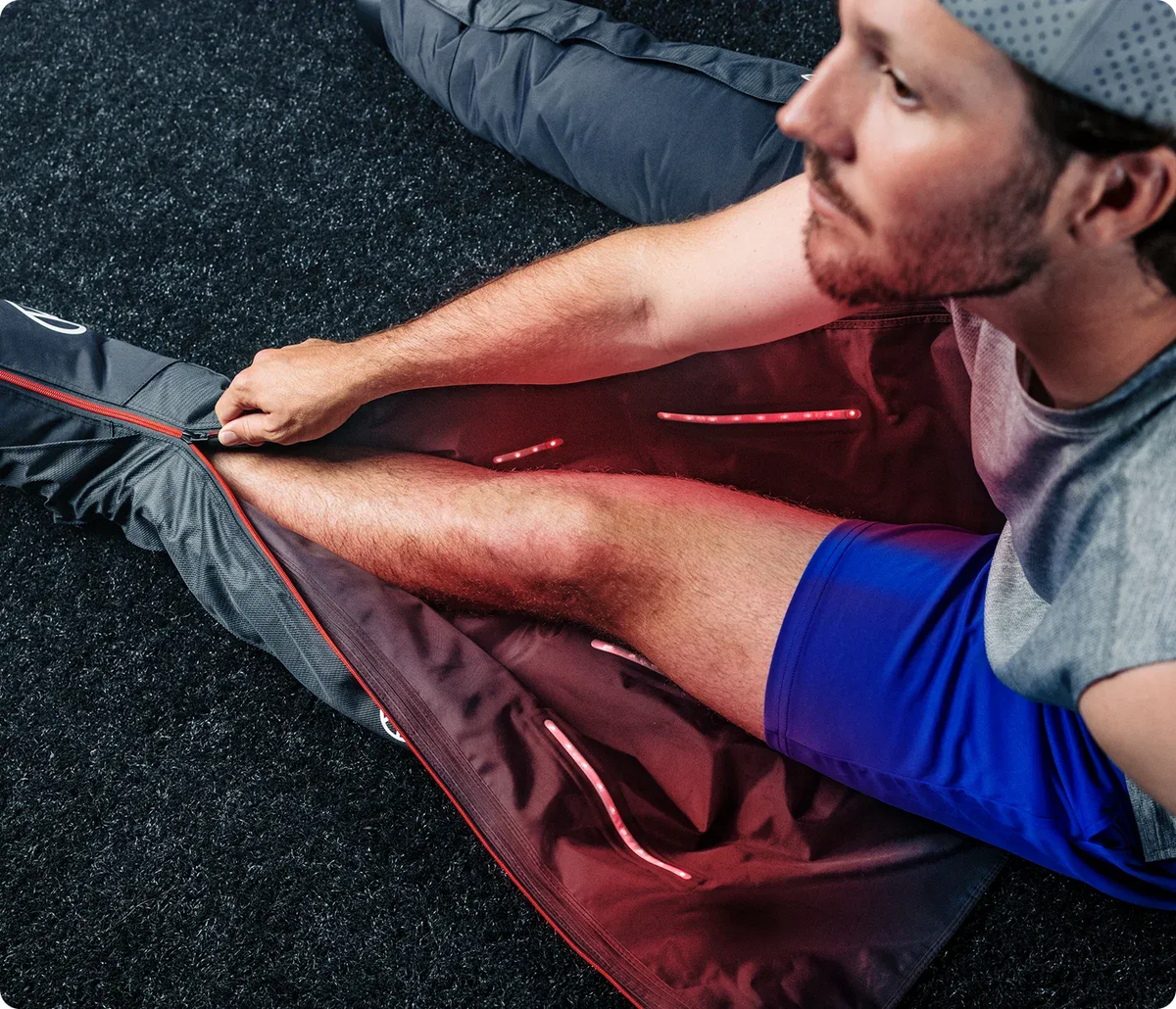 Man using Therabody JetBoots PRO Plus Wireless Leg Compression boots