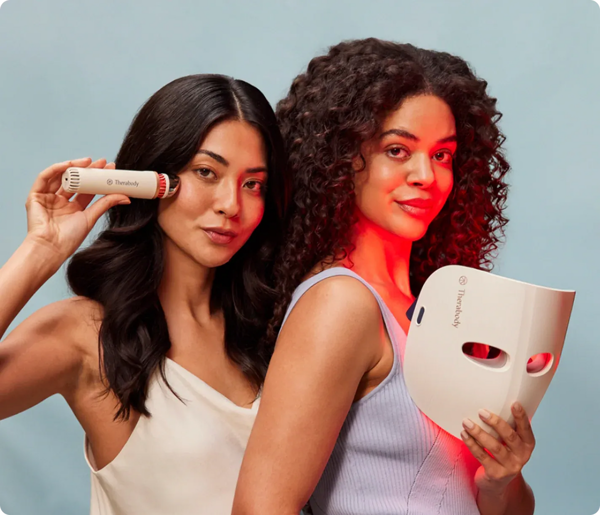 Two women using LED light therapy skincare devices for facial rejuvenation and skin wellness