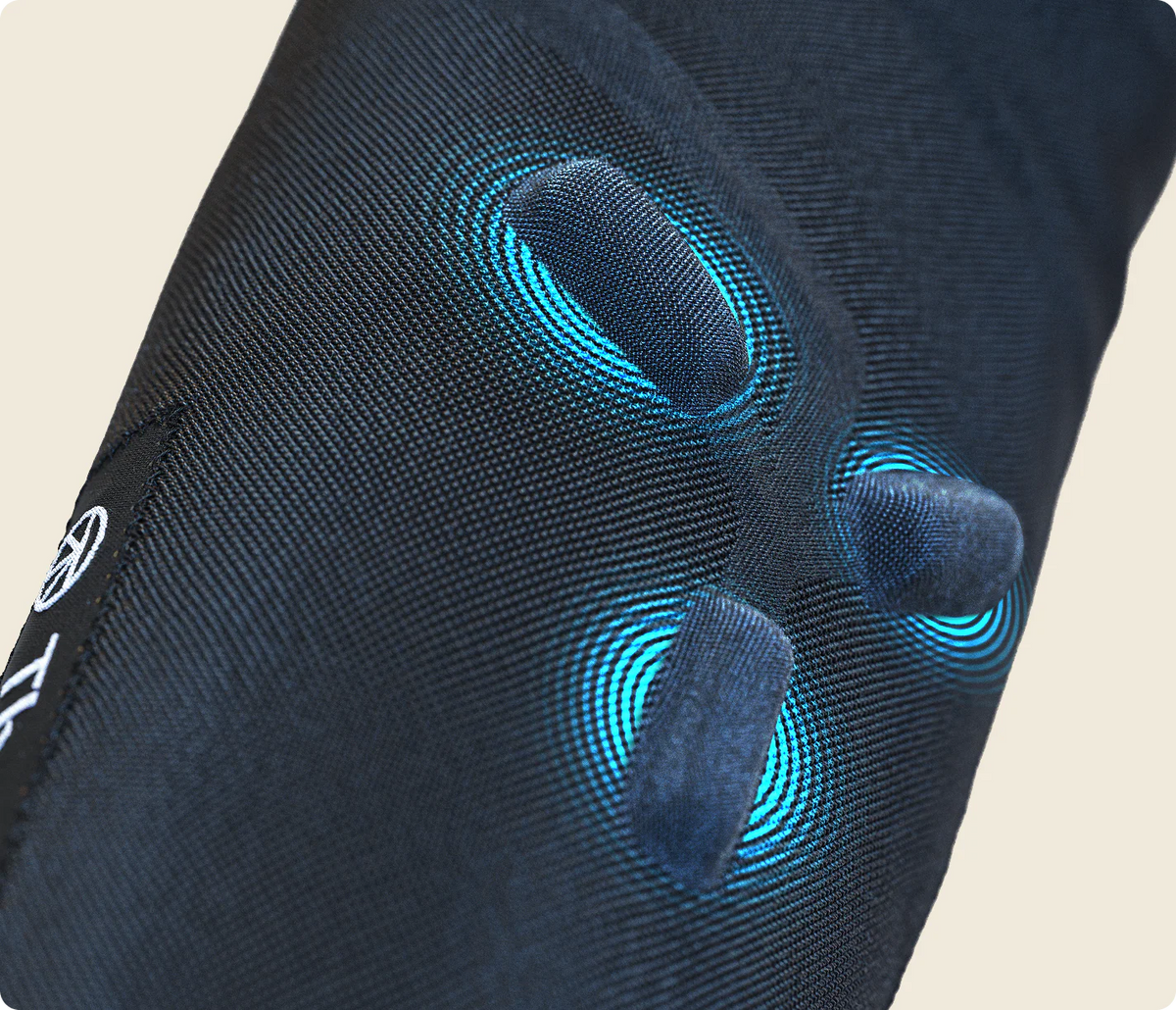 Therabody RecoveryPulse Arm sleeve showing targeted compression zones