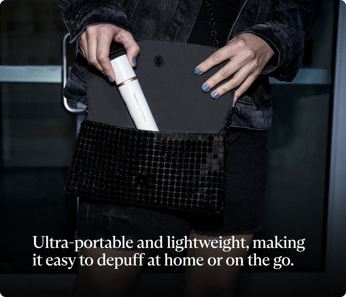 Portable TheraFace Depuff facial therapy device stored in a handbag for travel and on-the-go use