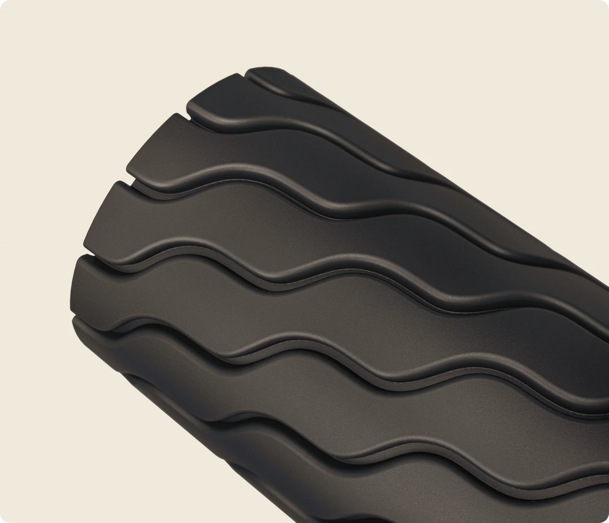 Close-up of textured Therabody foam roller surface for targeted muscle therapy