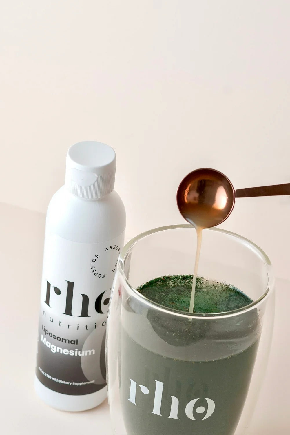 Rho Nutrition Liposomal Magnesium bottle wellness drink