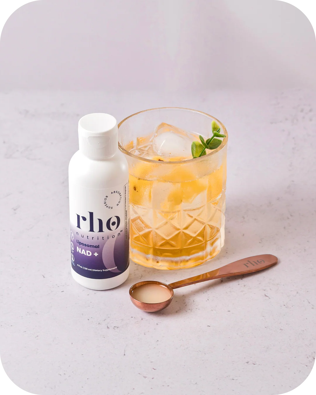 Rho Nutrition Liposomal NAD+ mixed drink with supplement bottle