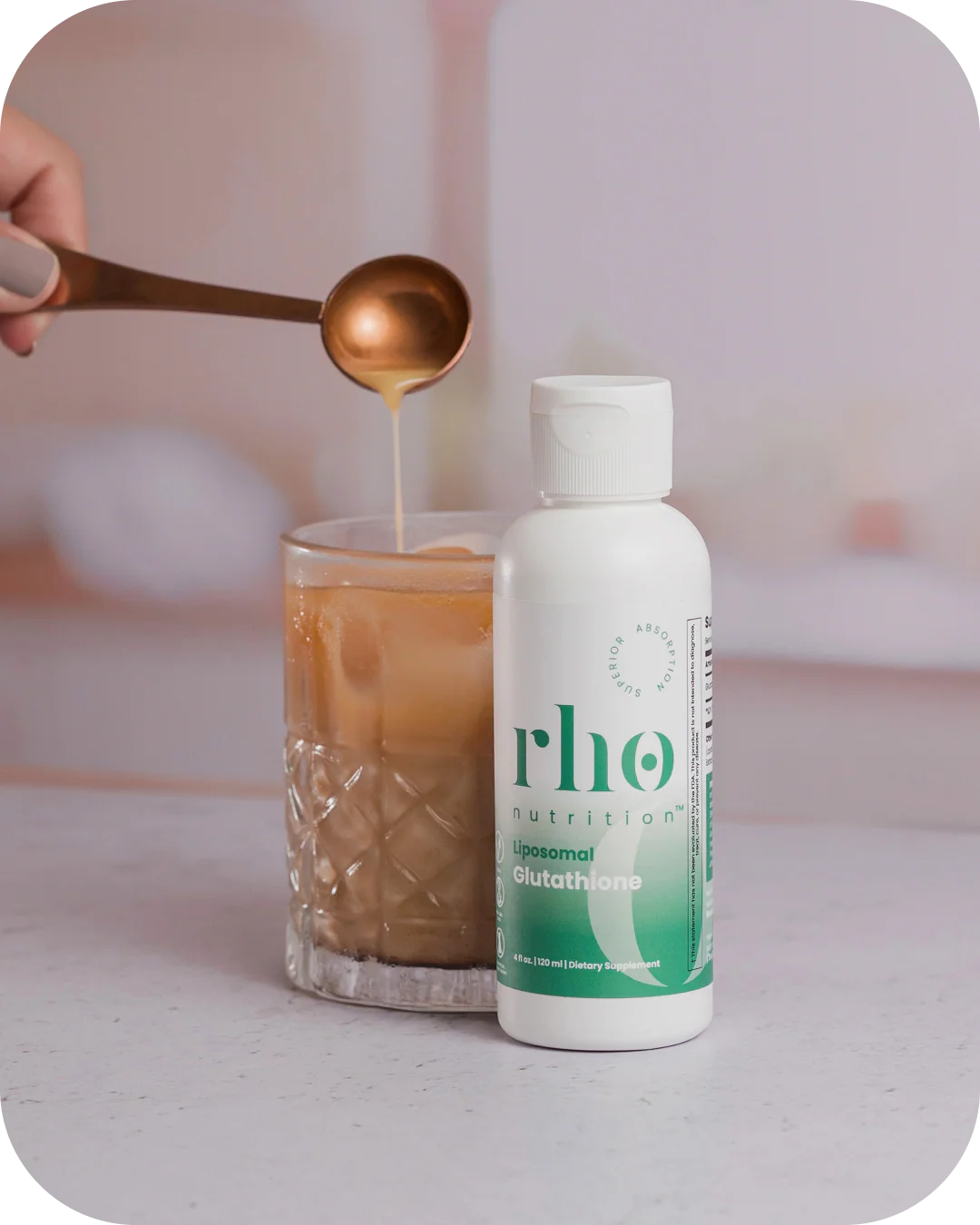 Prepared Rho Nutrition Liposomal Glutathione drink beside supplement bottle