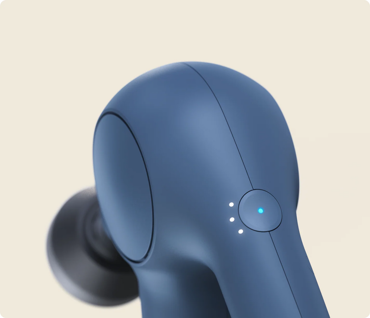 Therabody Theragun Relief Navy ergonomic handle and control button
