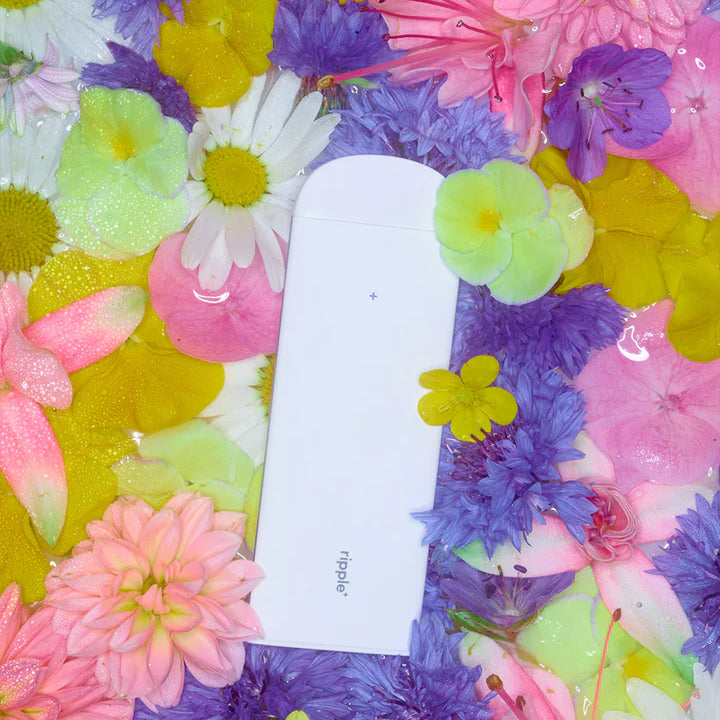 Ripple disposable vape device floral background